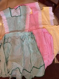 A Group Of Like New Candy Stripe Aprons