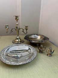 A Group Of Silver Plate Bowls And Candelabra