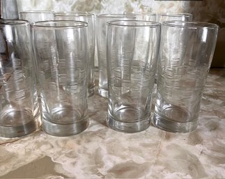 A Group Of 8 Etched Tall Drinking Glasses