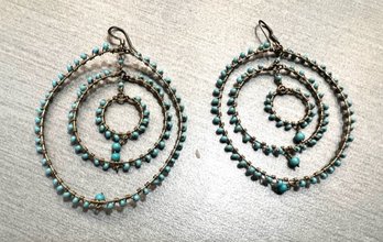 A Pair Of Earrings Multi Hoops With Turquoise Colored Stones