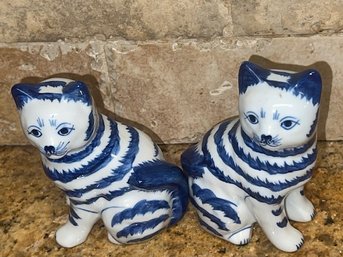 A Pair Of Blue And White Porcelain Cats