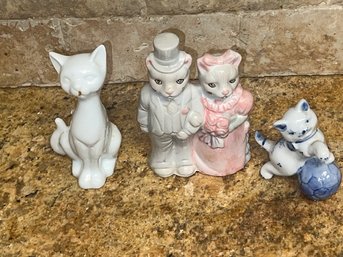 A Group Of Retro Porcelain Cats