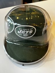 Signed New York Jets Hat And  Display