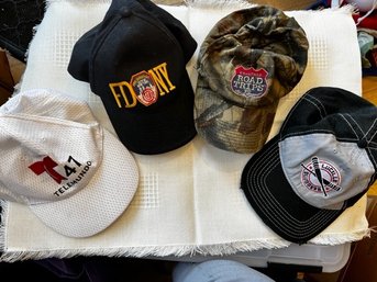 A Group Of 4 Baseball Caps FDNY, Telemundo, Road Trips And Lucille Sluggers