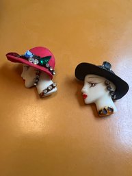 A Pair Of European Pins Ladies Heads