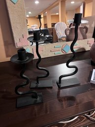 A Group Of 3  Wrought Iron Candle Sticks