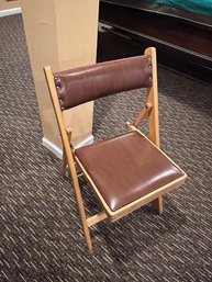 A Wood And Leather Folding Chair Made In Romania