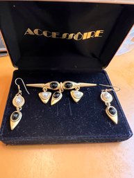 Group Of Gold Tone Earrings And Pine And Black Jewelry Ensrmble