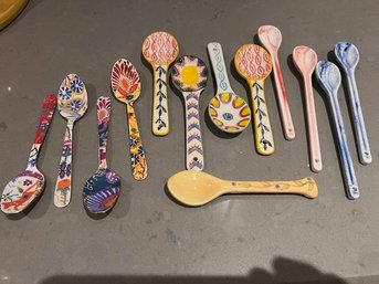 A Large Group Of Hand Painted Ceramic Etc Spoons Various Sizes