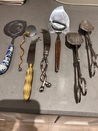 Mixed Group Of Cheese Knives, Tongs, Cake Etc