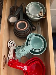 A Full Drawer Of Measuring Cups And Spoons!plastic And Ceramic