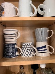 A Cabinet Of 8 Larger Mugs, Blue And White Etc