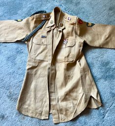 A Vintage Khaki Military Shirt With Dog Tags