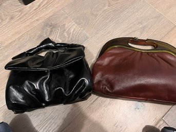 A Pair Of Leather Clutch's One Zara Probably New And One By Niki's Of Beacon With Lucite Handle