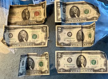 A Group Of 6 Two Dollar Bills One From