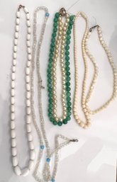 Group Of Various Beaded And Crystal Necklaces Having Different Coloring