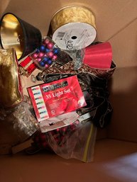 Box Of Christmas Ornaments, Ribbons, Lights, Tree Holder Etc