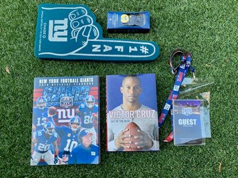 Signed Victor Cruz Book And NY Giants Paraphernalia Including Guest Pass On Lanyard 2014