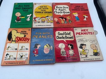 A Group Of 8 Peanuts Paperbacks 1950's -60's