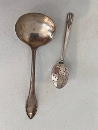 A Pair Of Silverplated Utensils, Tea Strainer And Ladle