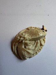 An Asian Carved Fish Pendent