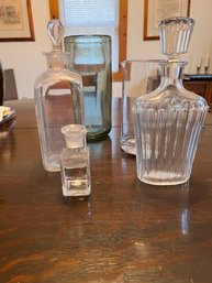 2 Crystal Decanters Including One Baccarat  And A Glass Pitcher, Vase And Small Glass With Stopper