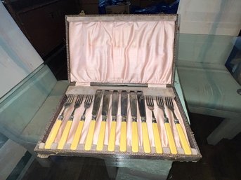 An Antique Set Of  Service For 6 Forks And Knives With Sterling Silver Bands On Bone Handles