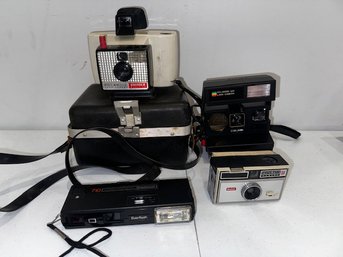 A Group Of Polaroid And Kodak Cameras, 600 Land Camera. Swinger Etc