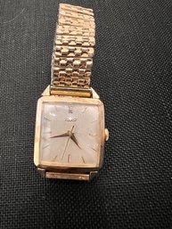A Men's Tissot 14kt Gold Watch