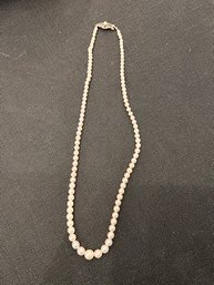 A Graduated Pearls With Silver Clasp Necklace