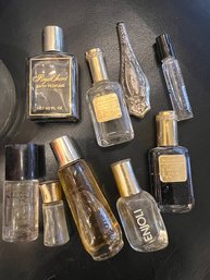A Group Of Vintage Miniature Perfume Bottles