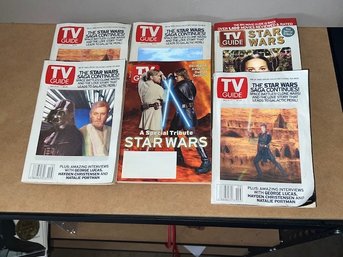 A Group Of 7 Hologram Star Wars TV Guides