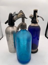 A Group Of Three Seltzer Siphin Bottles Varied Ages ONE MADE IN ENGLAND,  One Design Siphon,