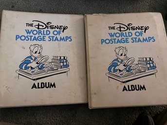 A Pair Of The Disney World Of Stamp Collection Books