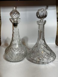 A Pair Of Glass Decanters