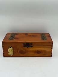 A Vintage Wooden Box With Religious Artifacts