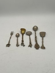 A Group Of 6 Italian Sugar Spoons And Cocktail Forks