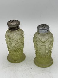 A Salt And Pepper Shaker Set In Yellow Uranium Glass