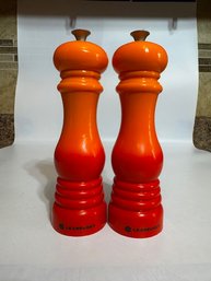 A Pair Of Unused Le Creuset Flame Salt And Pepper Mills (1) 8'