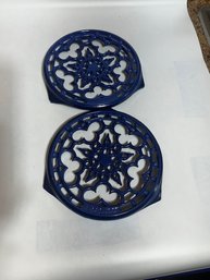 A Pair Of Le Creuset Blue Wrought Iron Trivets
