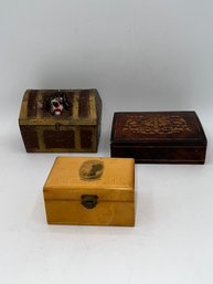 A Group Of Various Boxes, Inlaid Wood, Metal Treasure Trunk And Wooden