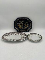 A Group Of Porcelain And Metal Trinket Trays