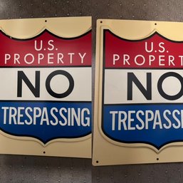 A Pair Of US Property NO Trespassing Embosssed Signs