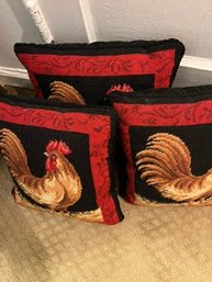A Group Of 3 Rooster Pillows In Red