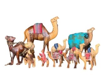 GROUPING OF CARVED WOODEN  AFRICAN CAMELS