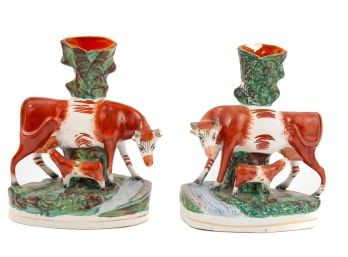 PAIR OF STAFFORDSHIRE COW & CALF SPILL VASES