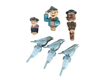 GROUP OF FIGURAL GERMAN STOPPERS & PLASTIC BIRDS