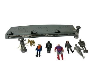 Nine (9) Star Wars Figures plus a Stand