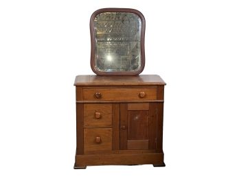 ANTIQUE MIXED WOOD COMMODE AND MIRROR