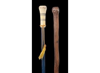 (2) FOLKY WALKING STICKS